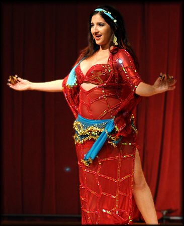 Andrea belly dances