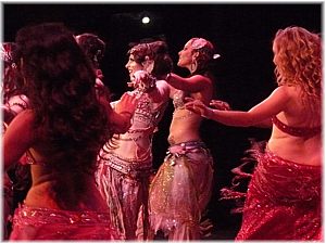 Tribal and Cab dance together