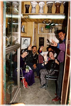 inside the shop, notice portrait of father on wall