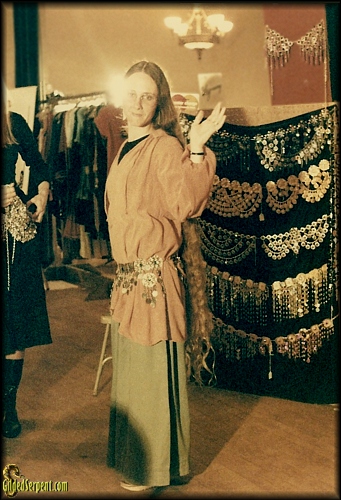 Marcia tries on a Costless belt