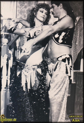 Asia and John dance together in Hollywood in 1984