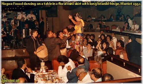 Nagwa Fouad dancing on a table at the Marriot in 1991