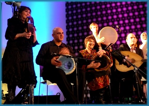 Amina and Loay play percussion